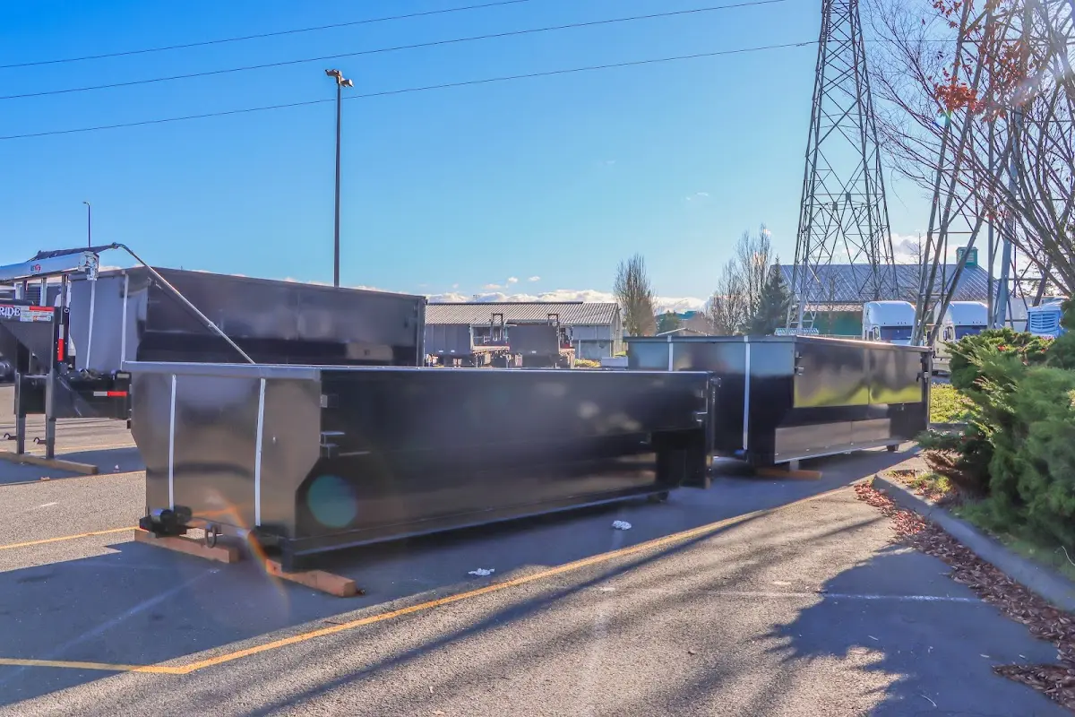 Roll-off dumpster ready for waste disposal at job site for 2 Yard Dumpster Rental in Visalia